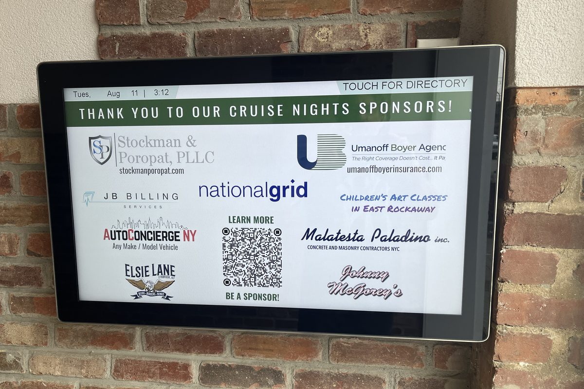 Sponsor logos on the Lynbrook walkway touch-screen directory
